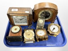 A group of antique and later clocks.