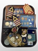 A group of military decorations, including rank chevrons, epaulettes,