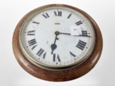 An early-20th century oak-cased station timepiece, width 38cm.
