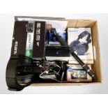 A group of electronics including Pioneer and Sony headphones, Fujifilm camera, Garmin SatNav,