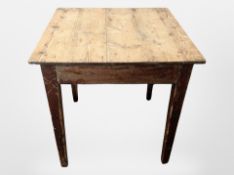 A Victorian pine kitchen table, width 73cm.