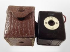 A vintage West German Bakelite cased Boy camera in leather case.