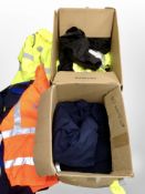 Two boxes containing high-visibility clothing and other work clothes, new with tags.