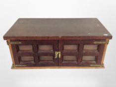 A coin collector's cabinet and contents to include British predecimal coins, crowns, etc.