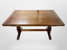 A reproduction oak extending refectory dining table, total length 207 cm,