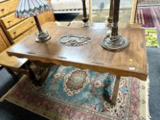 An Eastern carved hardwood refectory dining table,