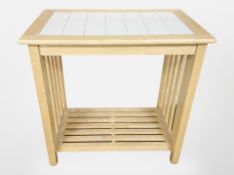 A pine tiled top kitchen preparation table with undershelf, width 90cm.