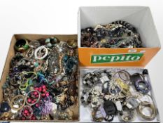 Three boxes containing a large quantity of costume jewellery, including bead necklaces, bangles,