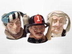 Three Royal Doulton character jugs, the Fireman, the Lawyer, and the Falconer.