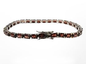 A silver gem-set bracelet,