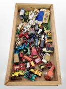 A pine tray containing assorted unboxed diecast vehicles including Burago, Lledo, etc.