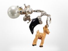 Three silver Bambi, shoe and Cupid charms with silver catches.