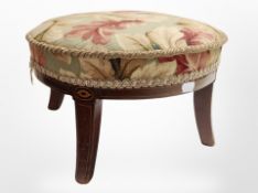An early 20th century satin wood and inlaid circular footstool,