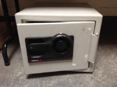 A Sentry combination safe with instruction manual,