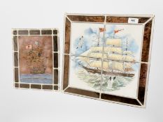 Two stained glass panels depicting boats.