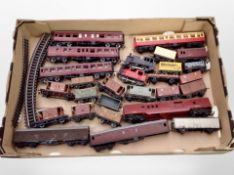 A collection of 00 gauge diecast rolling stock and track, including Tri-Ang.