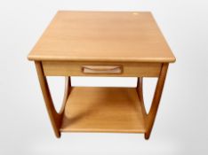 A teak effect lamp table,