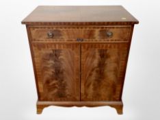 A reproduction mahogany and satin wood inlaid side cabinet and a further entertainment cabinet