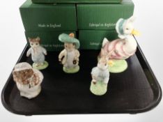 Five John Beswick Beatrix Potter figures, boxed.