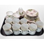 A Tuscan Windsor part tea set, and a set of 8 porcelain mugs.