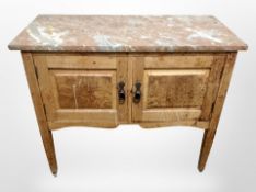 A late Victorian satin wood washstand with rouge marble top,