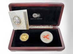 Mint of Norway - Mandela Red Ribbon Twin set to include 1/2 oz 24ct coin and Sterling silver coin