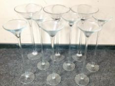 Nine contemporary glass flower arranging vases in the form of cocktail glasses,
