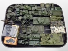 A collection of diecast military vehicles including Dinky, etc.