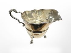 An Edwardian silver milk jug, Birmingham 1909, height 8cm. CONDITION REPORT: 65.