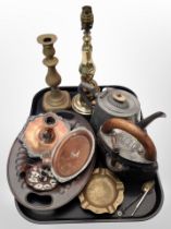 A group of metal wares including a 19th century pewter teapot, brass candlestick and lamp base,