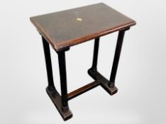 A 19th century ebonised prayer table,