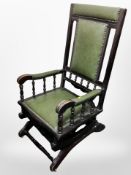 An American ebonised rocking chair