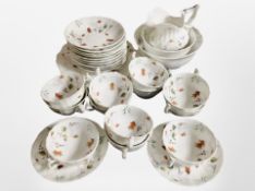 29 pieces of early-20th century hand-painted floral-decorated tea china.