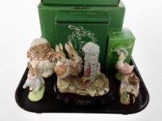 Five John Beswick Beatrix Potter figures, boxed, including Hiding From the Cat on wooden plinth,