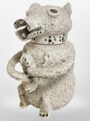 A Staffordshire salt glazed stoneware bear baiting jug and cover,