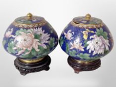 A pair of 20th century Chinese cloisonné bulbous lidded jars on stands, height 21cm.