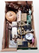A box of assorted collectables, including pipes on pipe racks, a safety razor, recorder,