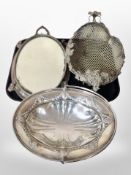 A 19th century silver-plated mirrored serving platter, further swing-handled basket,