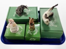 Four John Beswick animal figures including badger, Siamese cat, etc, boxed.
