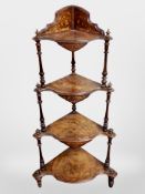 A Victorian burr walnut and satin wood inlaid four tier corner what not,