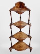 A Victorian burr walnut and satin wood inlaid four tier corner what not,