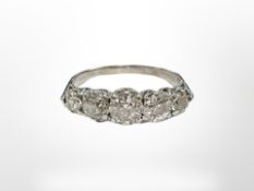 An 18ct white gold five stone diamond ring, the old-cut stones weighing an estimated 1.