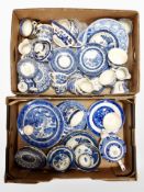 Two boxes containing blue and white willow-pattern ceramics including Real Old Willow, Churchill,