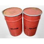 Two metal barrels,