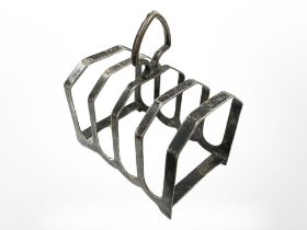 A George V silver toast rack, Viners Ltd, Sheffield 1932, length 9.5cm.