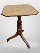 An Edwardian oak tripod occasional table,