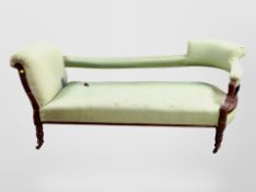 A Victorian carved walnut chaise longue and matching armchair