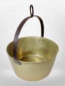 A large Victorian brass jam pan with cast iron handle, diameter 34cm.