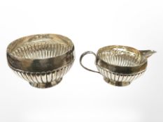 A Victorian silver sugar bowl and matching milk jug, Jonathan Wilson Hukin & John Thomas Heath,