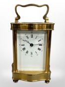 A French brass-cased carriage timepiece, eleven jewel movement with platform escapement,